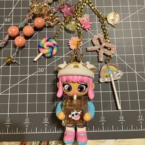 Ms Kweenie Bag Charm Pink and Blue Figure with Accessories